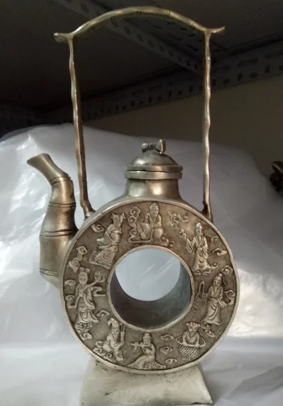 

Collection of decorative handmade silver carved square teapot