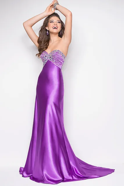 A satin sexy prom dress with bright and clear stones define an elegant ...