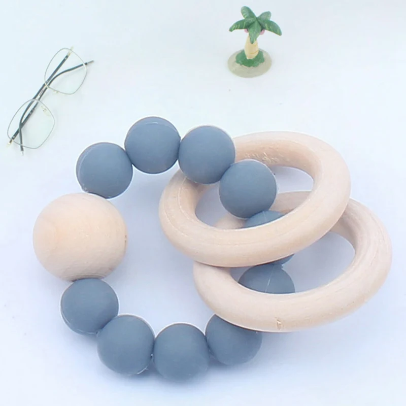 

Baby Nursing Bracelets Wooden Teether Chew Silicone Beads Teething Wood Rattles Molar Toys Teether Bracelets