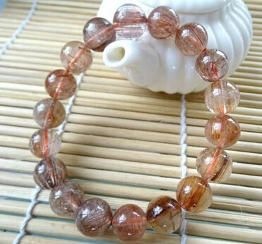 

002011 genuine copper rutilated quartz rock round stretch bracelet