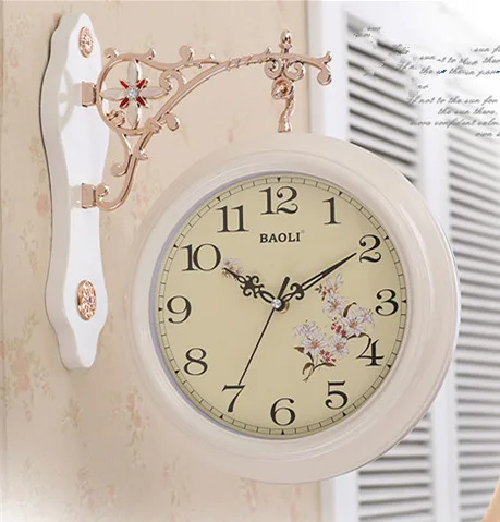 

The sitting room is double wall clock, european-style creative mute clocks and watches, fashion personality rural quartz clock.