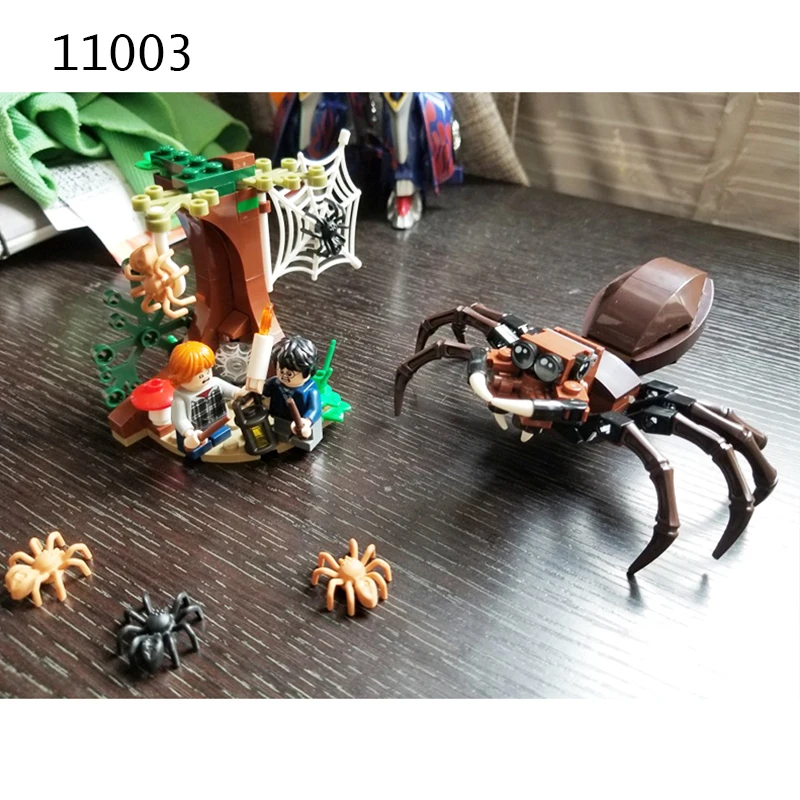 11003