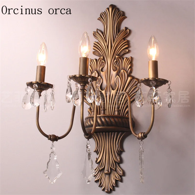 

The high-end luxury American retro copper wall lamp villa living room backdrop aisle French bedroom bedside crystal wall lamp