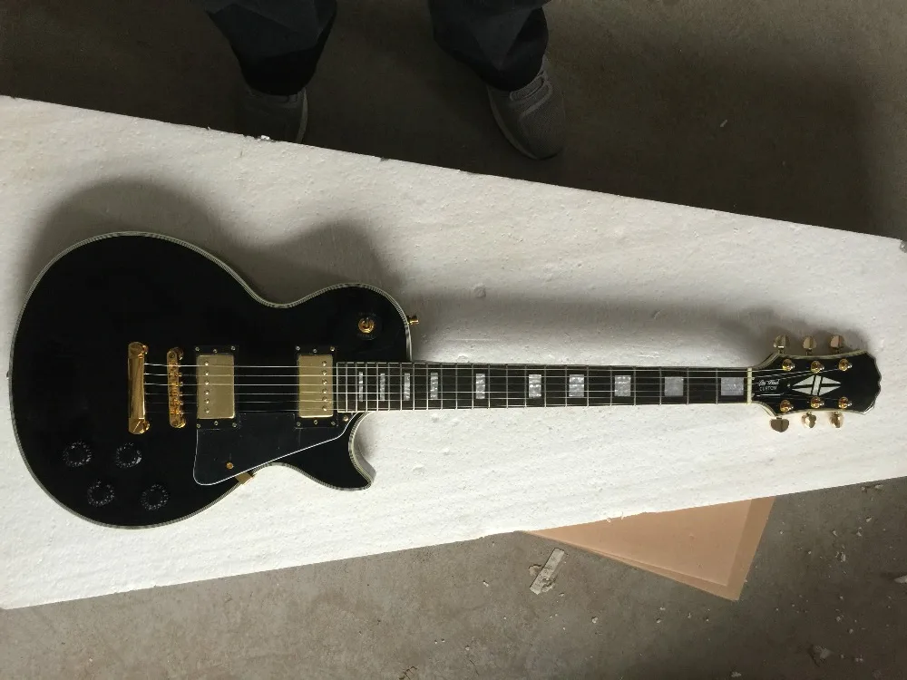 Factory wholesale high quality GYEP-3010 Black color golden hardware  Solid mahogany body Electric Guitar, Free shipping
