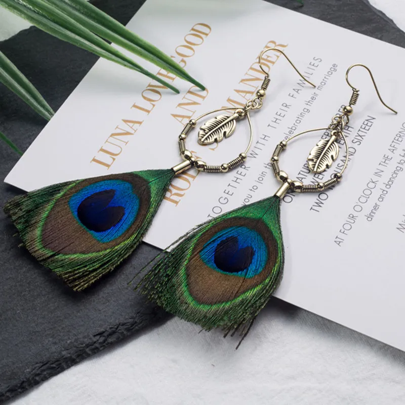 

2019 Vintage Round Alloy Peacock Feather Earrings bohemian long feather dangle earrings Charm jewelry for womens