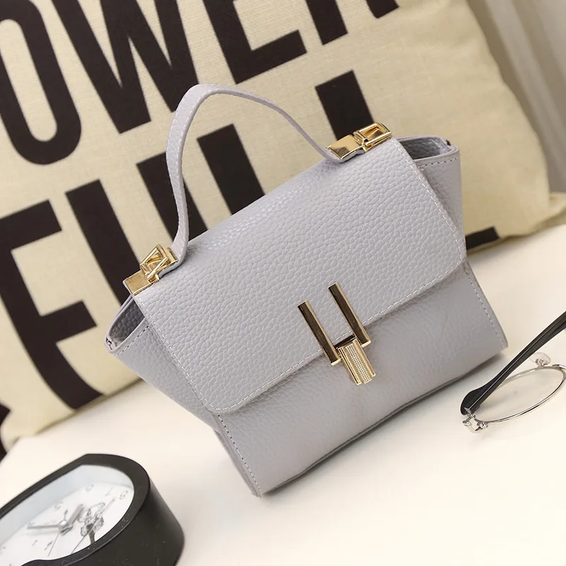 

2018 New Women Fashion Small Trapeze Tote Lichee PU Leather Mini Shoulder Messenger Bags New Design Wing Handbags Female Bolsas