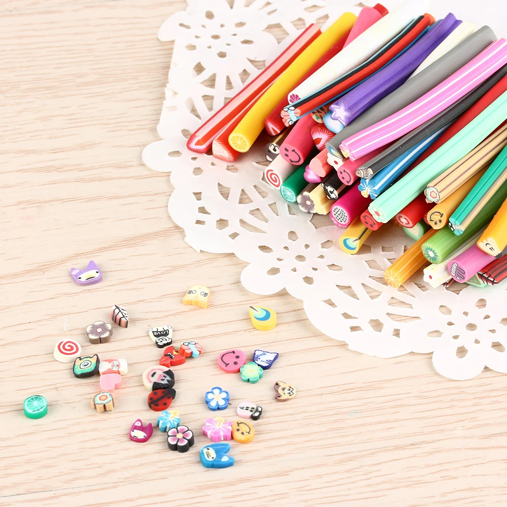 

50Pcs Nail Art Tips Fruit Flower Butterfly Heart Feather Animal Fimo Canes Rods Polymer Clay Nail Art Stikers Manicure Tools