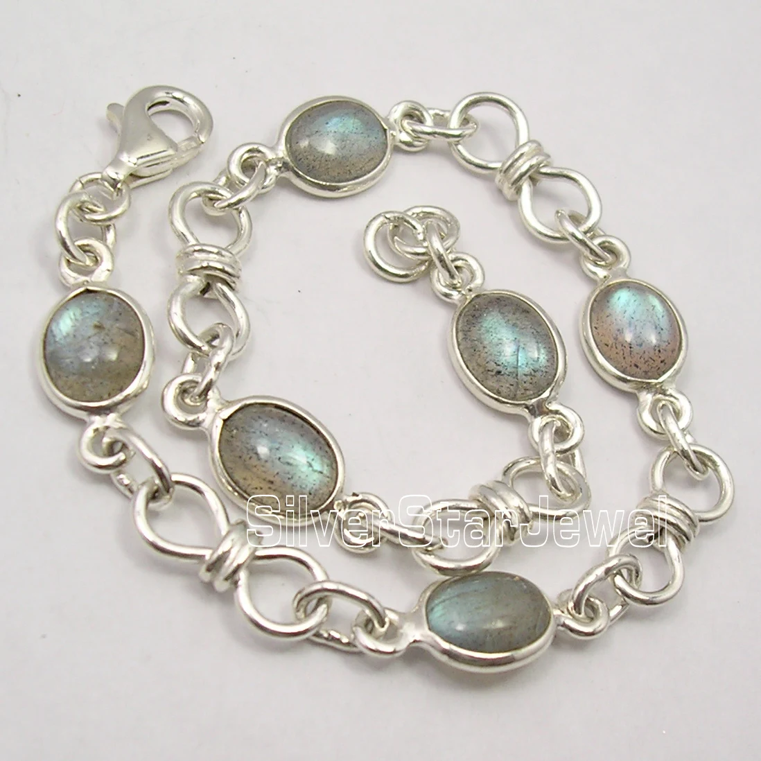 

Chanti International SOLID Silver BLUE FIRE LABRADORITE Multi Stone CUTE KNOT Bracelet 8 Inches
