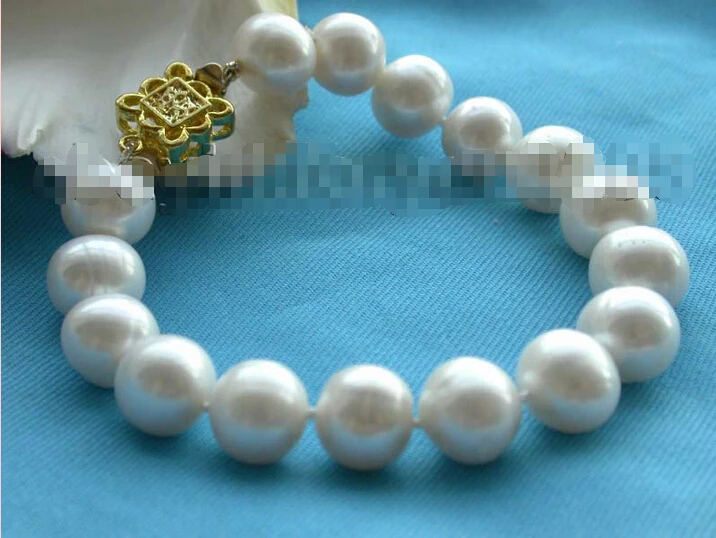 

Free shipping >>>>>>8" Genuine Natural 12mm Rould white shell Bracelet!