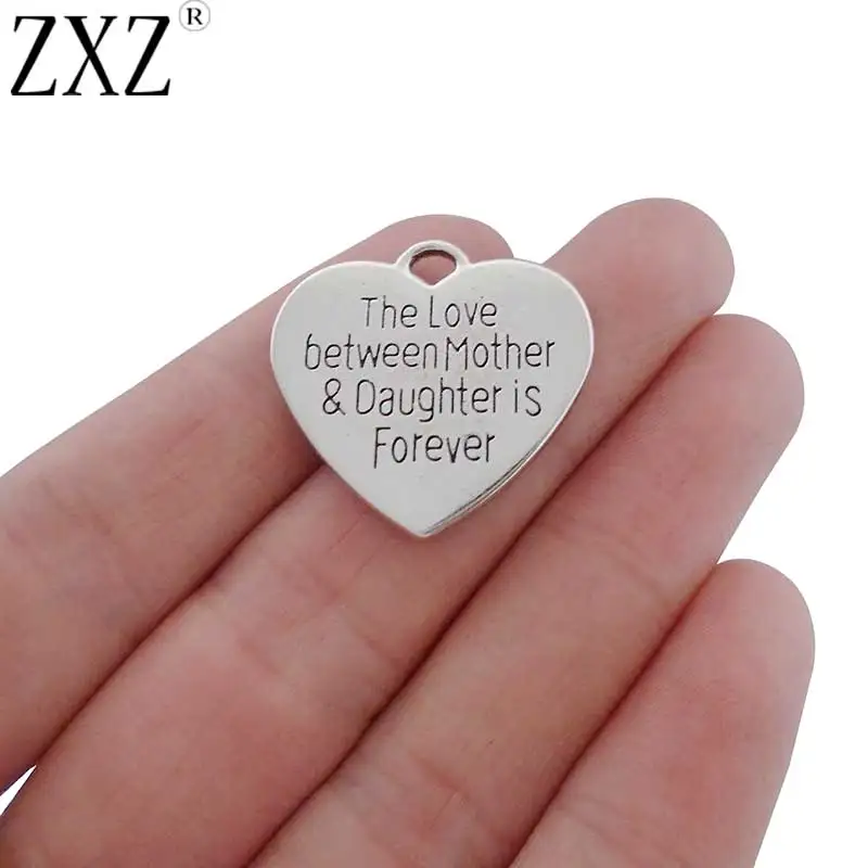 

ZXZ 10pcs Antique Silver Tone The Love Between Mother & Daughter is Forever Heart Charms Pendants for Necklace Bracelet Making