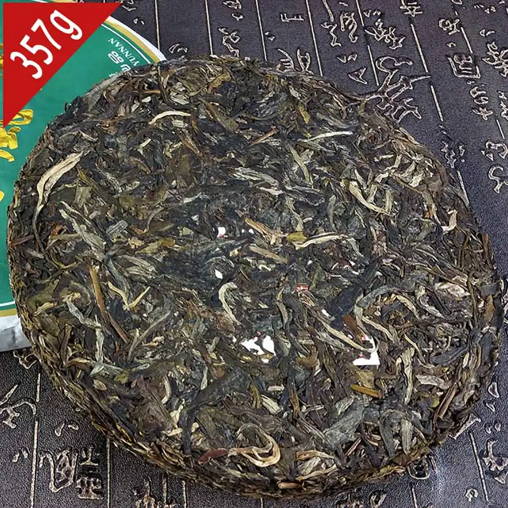 2012 Yr Yi Wu Millenary Old Tree Wild Shen Pu-erh 357 г, ветреное специальное железное сырье Pu-erh торт