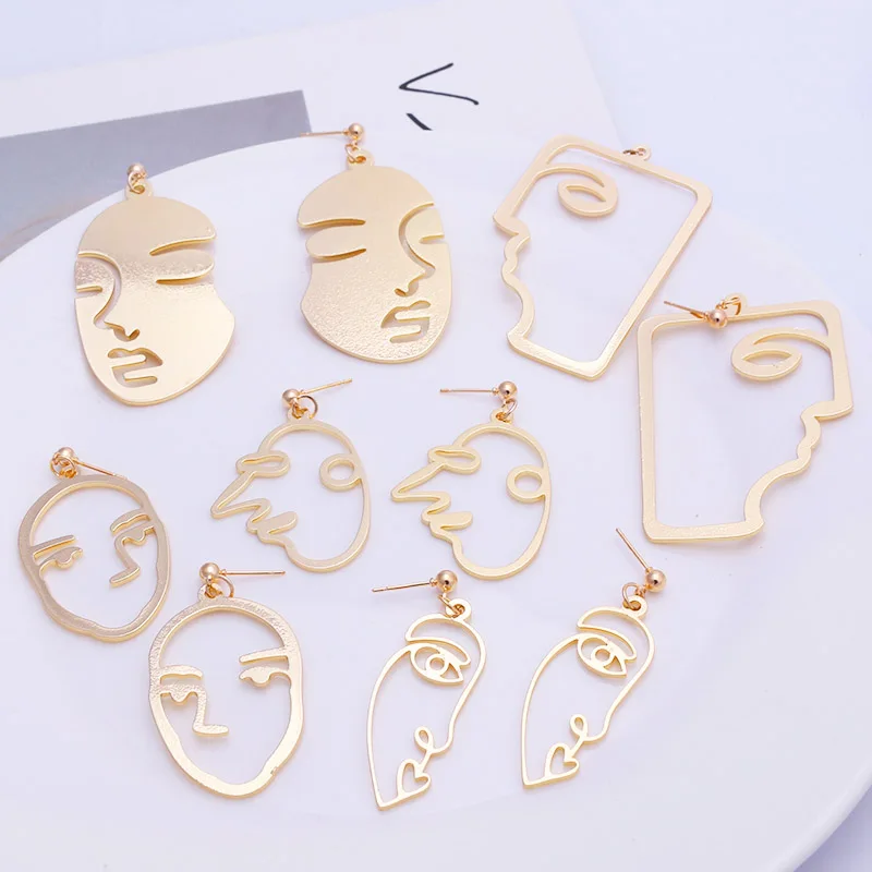 

2019 New Arrival Abstract Stylish Hollow Out Face Dangle Earrings Girls Statement Drop Earrings Charm Statement Earrings ES420