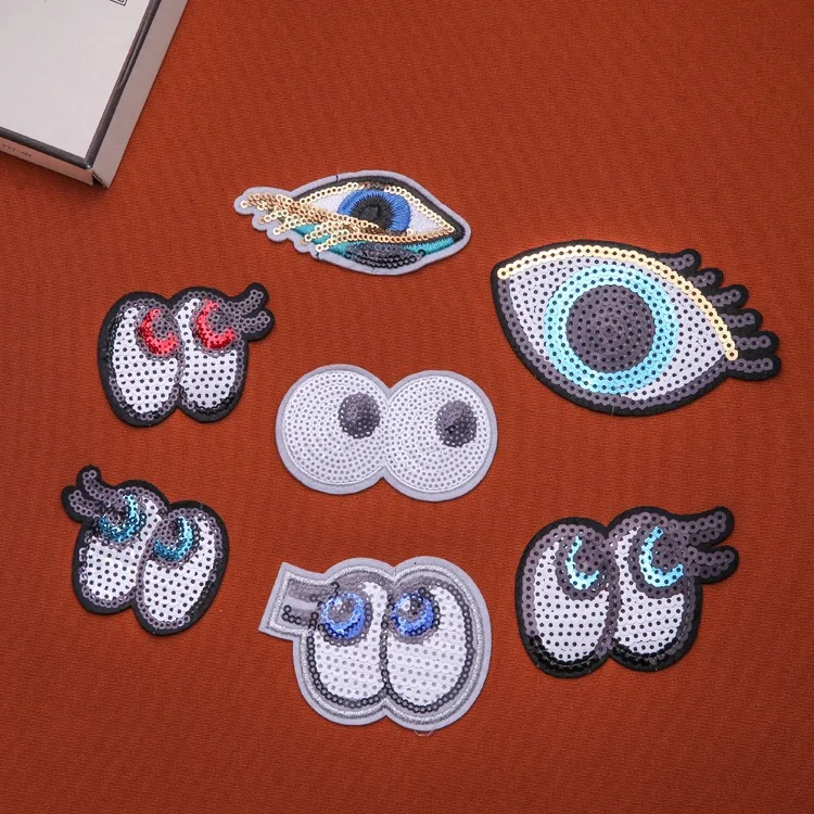 

10 Pieces/lot 7 Kinds Small Eyes Sequined Patches for Clothes Bags Shoes Iron on Sequins Embroidery Eyeball Decoration Appliques