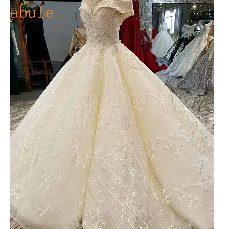 

Princess Wedding Dress 2018 cap sleeve Weddding Dresses Appliques Leaves Lace bride Wedding Gowns Real photo Robe De Mariage