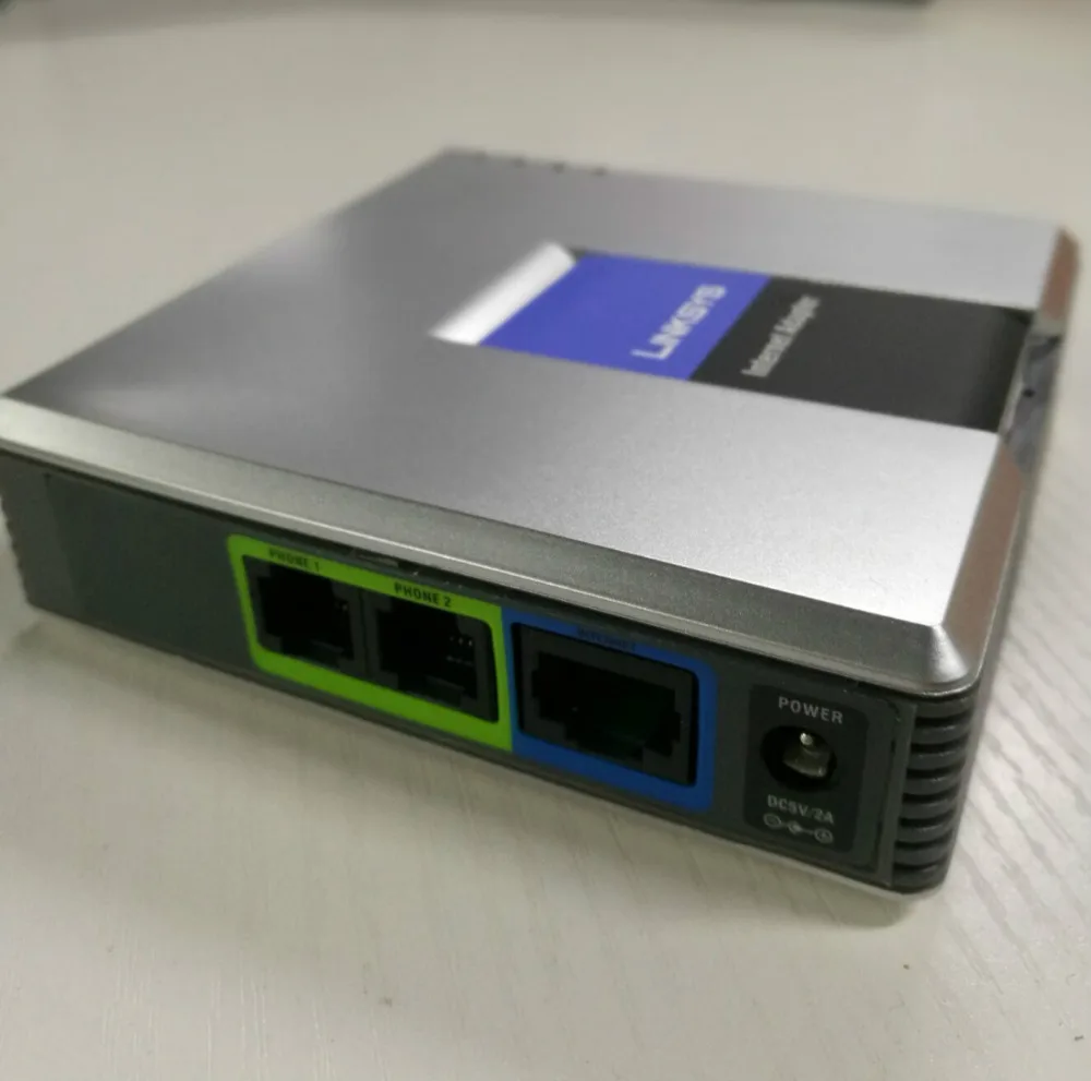 

Unlocked Linksys PAP2T phone adapter PAP2T-NA internet adapter ATA sip VOIP gateway