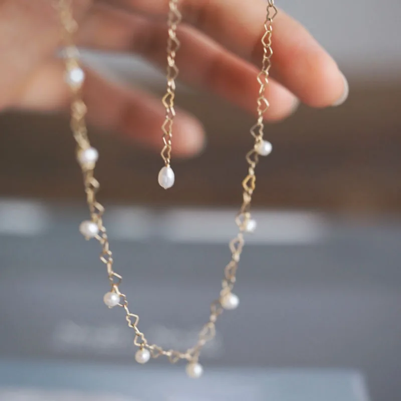 

Women Chokers Necklaces Hollow Simple Style Egg Shaped Pearl Jewelry Personality Female Gold Color Heart Chains Party Necklace