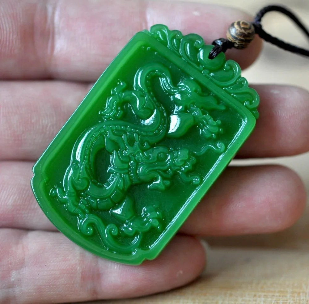 Chinese Rich Green Natural Hand Carved HeTian Jade Dragon pendantin