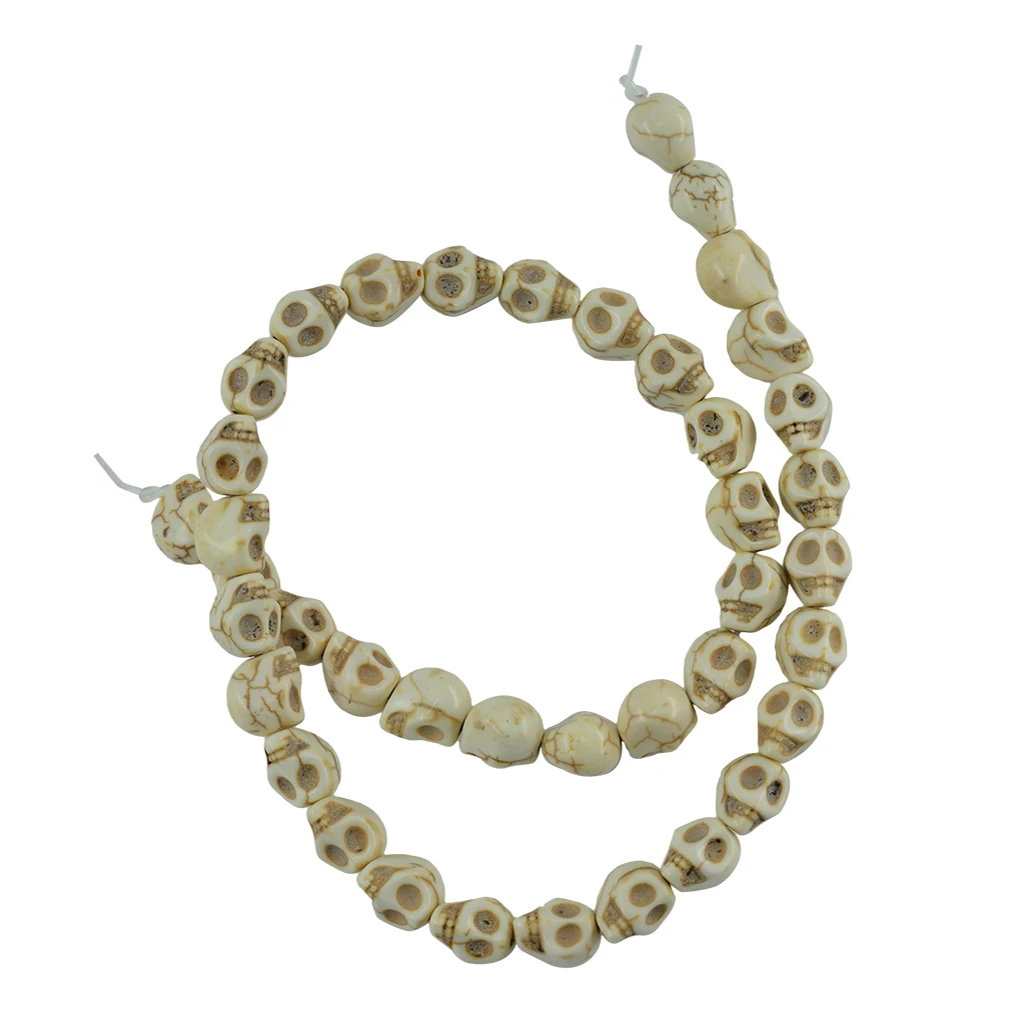 1 Strand White Howlite Turquoise Carved Skull Spacer Beads  8x6 mm  52pcs