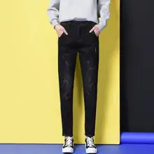 Женские весенние и осенние шаровары джинсы большого размера черные тонкие укороченные брюки