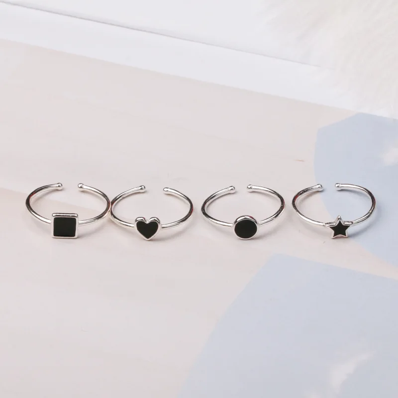 

Black Geometrical Ring Female Personality Open Drip Oil Ring Simple Star Triangle Heart Ring Tail Ring
