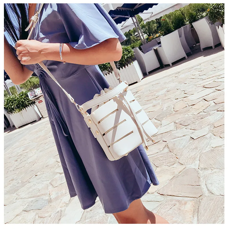 

Women's fashion hollow multi-function bag multi-layer handbag bucket bag Korean version of the wild single shoulder Messenger ba