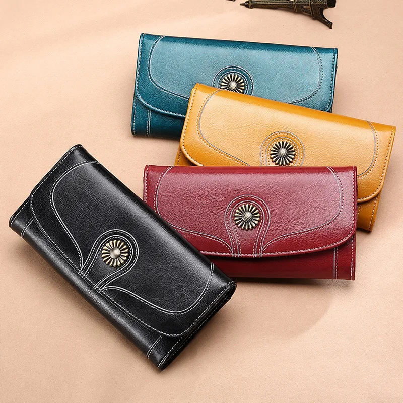 

Women's long section cowhide large-capacity wallet oil wax skin two fold wallet multi-card hand clutch bag Yangyang flower buckl