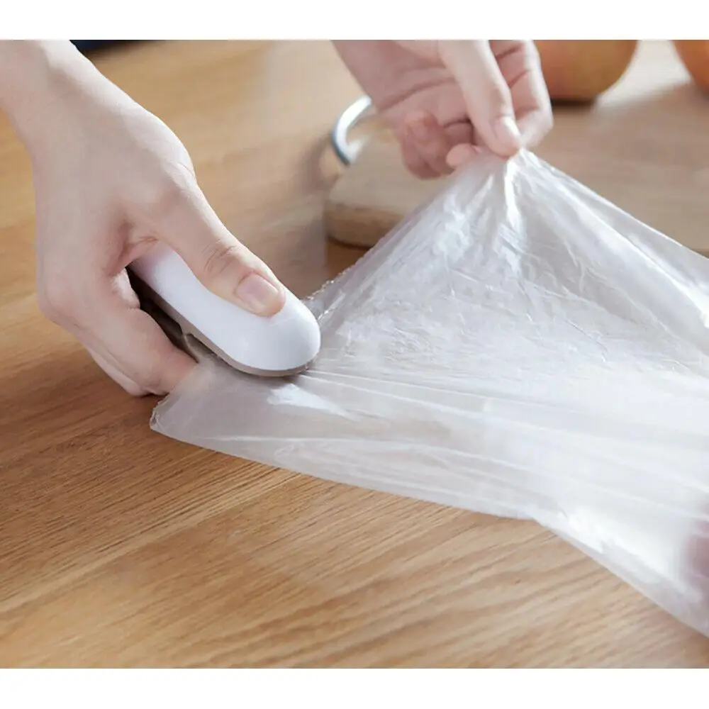 

Portable Mini Sealing Househeld Machine Package Heat Sealer Capper Food Saver For Plastic Bags Packing Dual-Use Mini Gadget