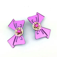Розовые женские акриловые сережки с бантом