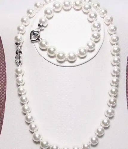 

Free Shipping >>>>> HUG Eelgant 18"11-12MM SOUTH SEA WHITE PEARL NECKLACE& BRACELET