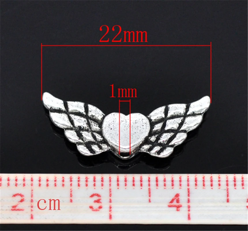 DoreenBeads 50 сердечко серебряного цвета &amp разделитель &quotкрылья&quot Beads 22x9 мм (B13230)