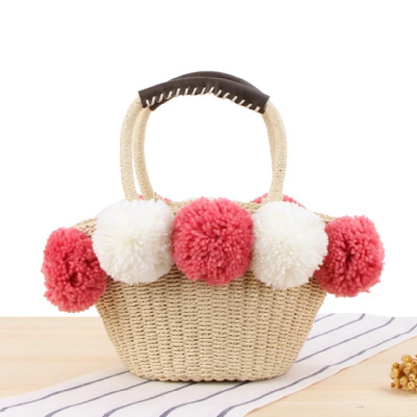 

National style super cute hand-woven woven holiday beach bag cute hit color large wool ball straw bag small fresh leisure bag