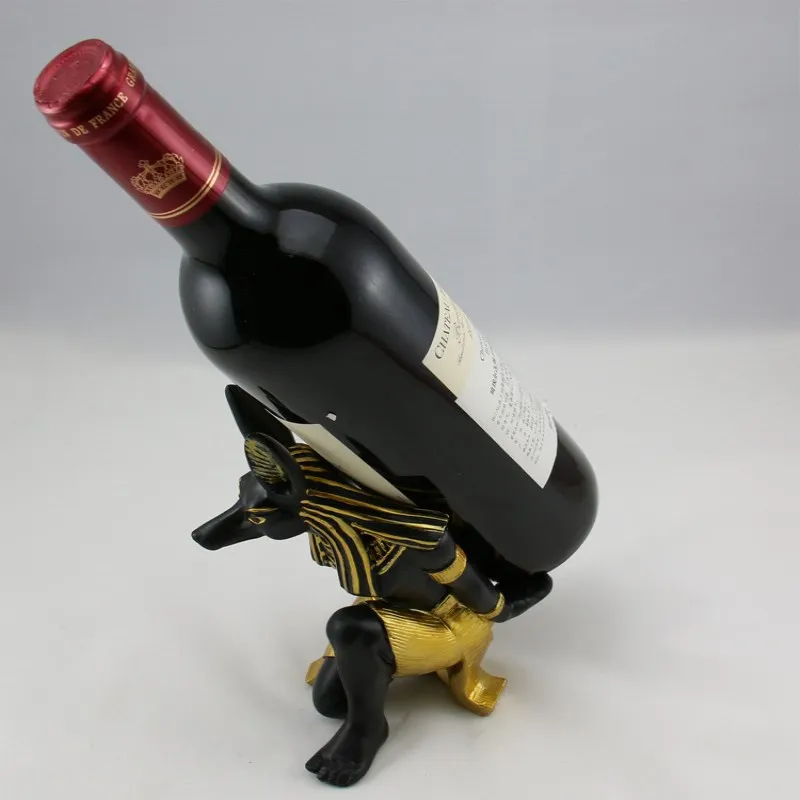BUOP Ancient Egyptian Deity Wine Bottle Stand with Bottle Stopper Black and Golden Anubis Statue Crouched on One Knee Egyptian Design and Decor 