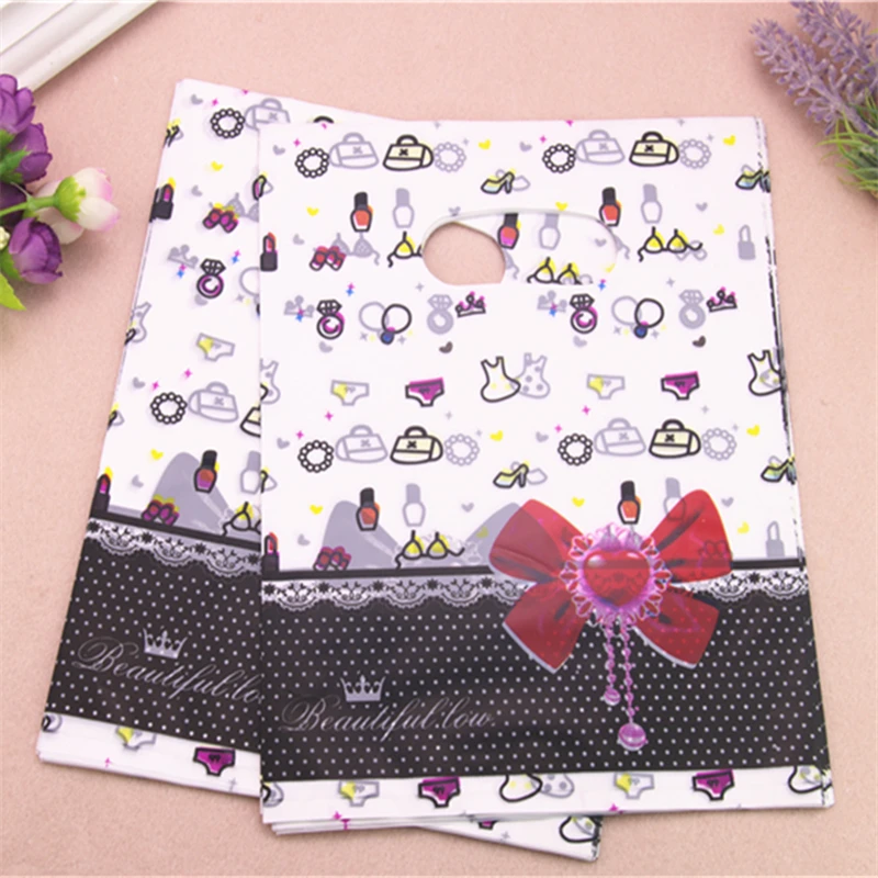 2016 New Design Wholesale 100pcs/lot 20*25cm Fashion Pink Luxury Plastic Bags With Love Heart Birthday Gift Packaging Bags