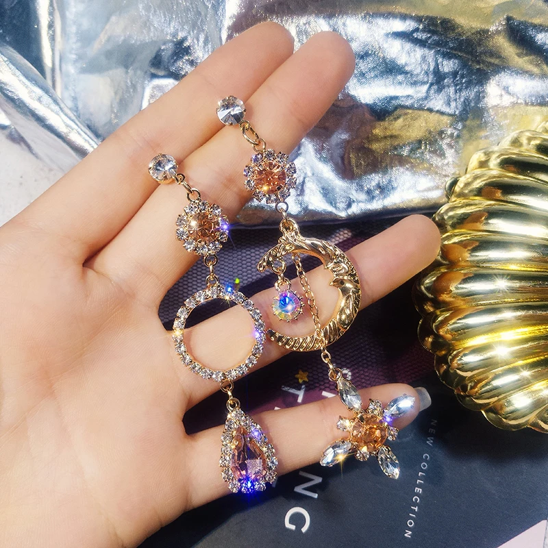 

Europe and the United States new asymmetric moon earrings women suitable for round face earrings long section slim earrings