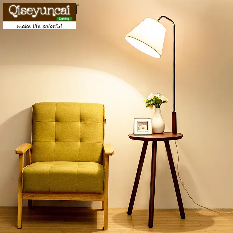 

Qiseyuncai Nordic living room wood floor lamp personality creative fashion triangle shelf with coffee table sofa floor lamp