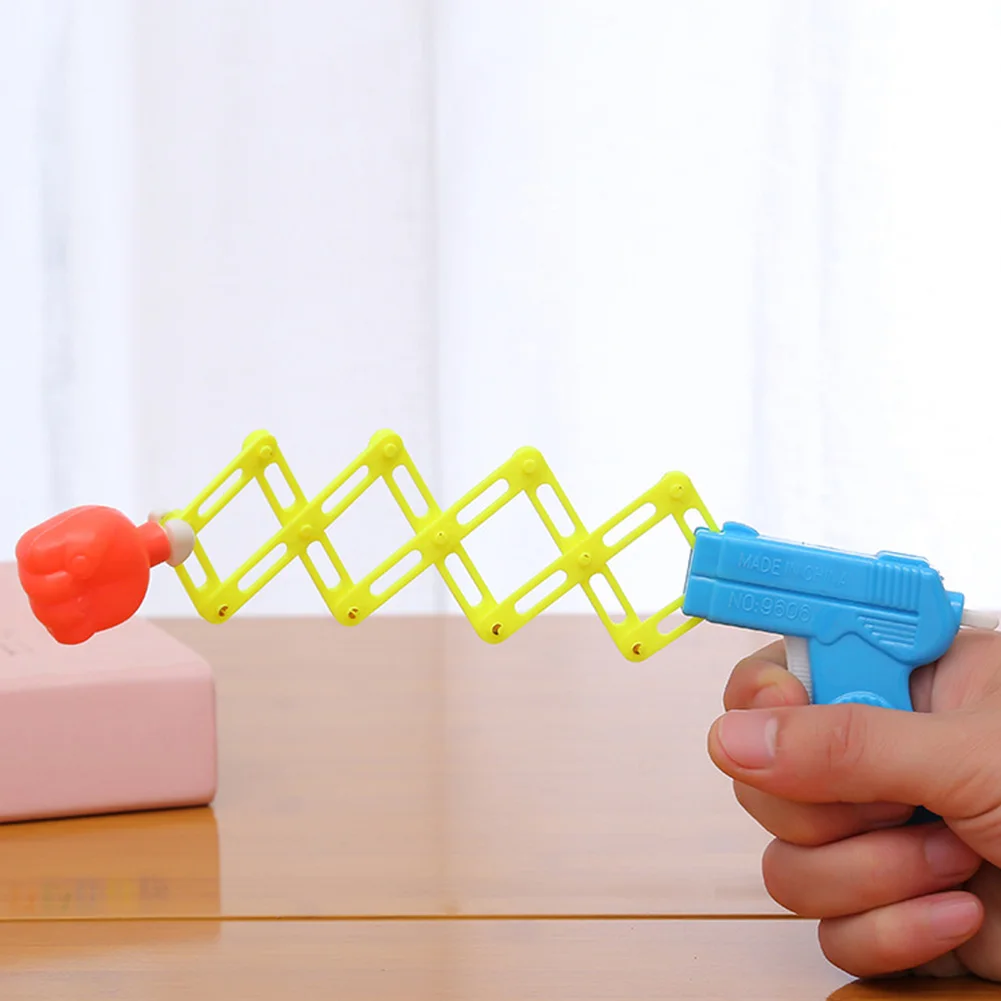 Boys Girls Plastic Prank Prop Elastic Spring Fist Magic Funny Children Toys Girls