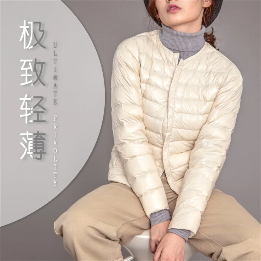 

Spring and autumn models ultra-thin women's round neck short paragraph light white duck down 90% liner large size down jacket
