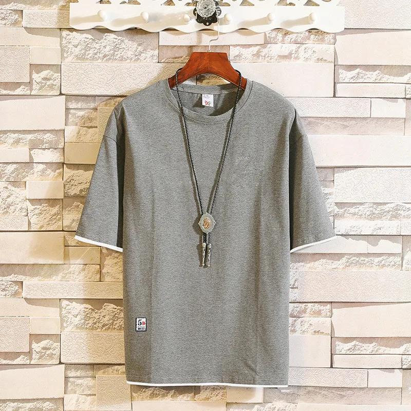 

2019 New trend short-sleeved t-shirts in summer men's round-collar fake two half-sleeved shirts Korean version leisure MP94