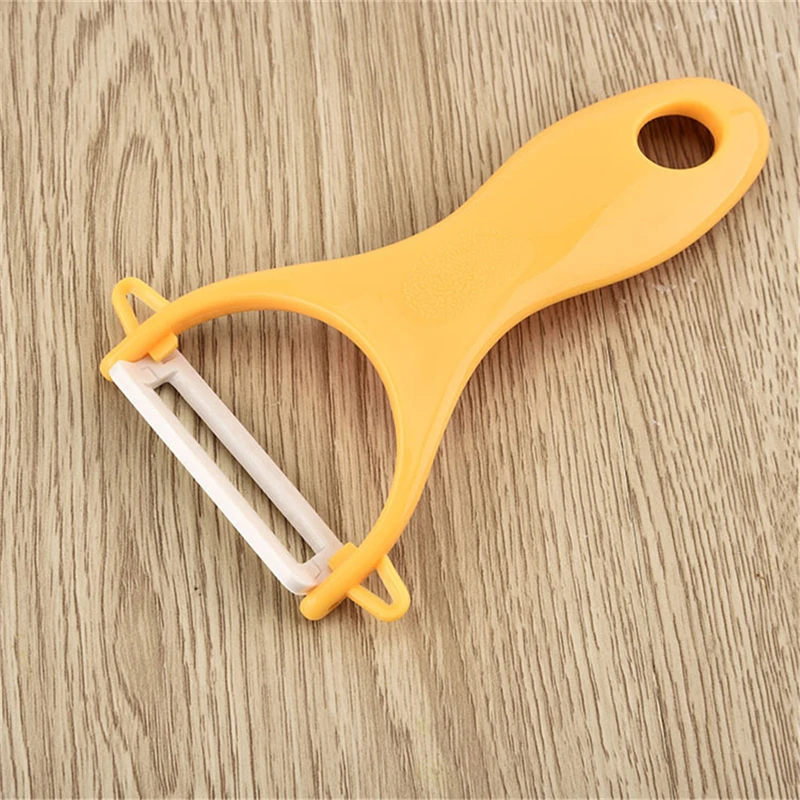 2018  New Creative Stainless Steel Ceramics Fruit Peeler Parer Cutter Kitchen Tool safe and easy to clean  hot sale  C0202      02