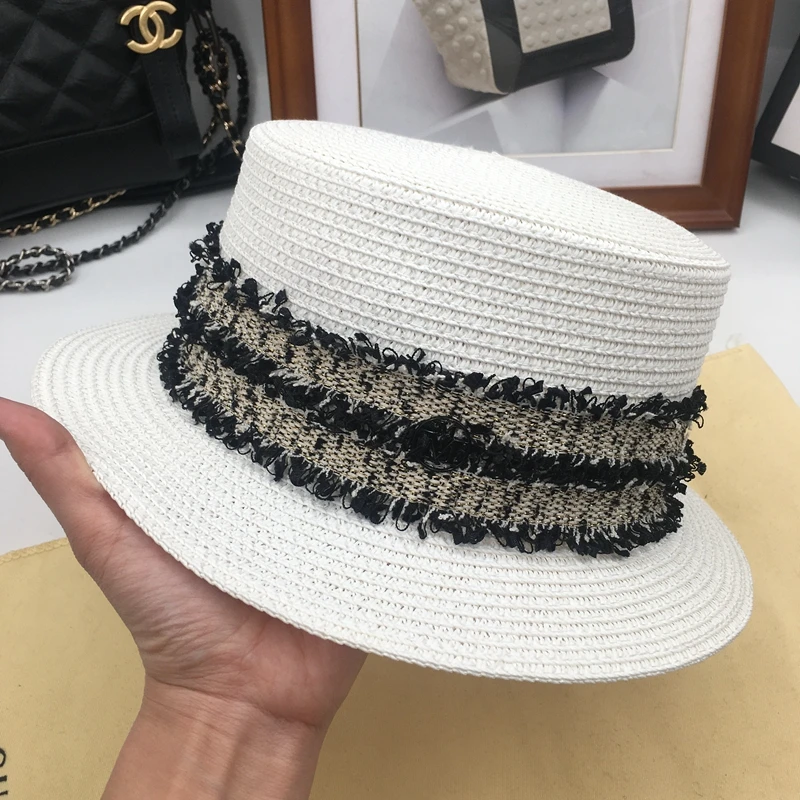 The new small wind white straw hat flat top width woven straw hat ms sun hat hat shading black
