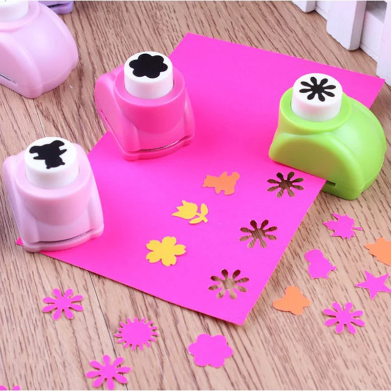 

Embossing DIY Paper Punch Cutter Kid Child Mini Printing Hand Shaper Scrapbook Tags Cards Craft Tool 1 PCS Free Shipping