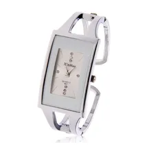 XinHua De Luxe Marque Montre Femmes Cristaux De Mode En Acier Plein Bracelet Montre À Quartz Femmes Robe Montre reloj mujer relogio feminino