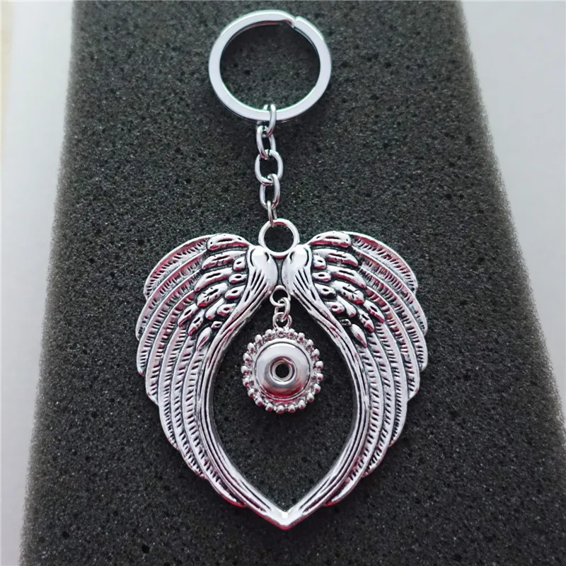 

Vintage Antique Silver Tibetan Angel Wing Keyring 12mm Snap Buttons Keychains Jewelry