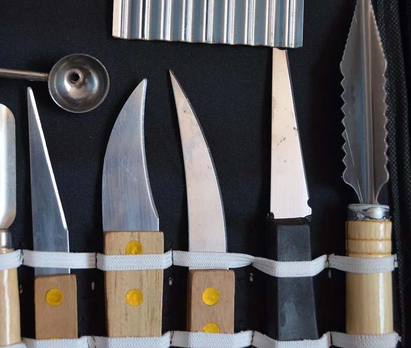 https://ae01.alicdn.com/kf/HTB1CT6wJpXXXXbzaXXXq6xXFXXXQ/New-80pcs-set-Vegetable-Fruit-Carving-Chisel-Tool-Chef-Kit-Carving-knife-set-Hand-carving.jpg
