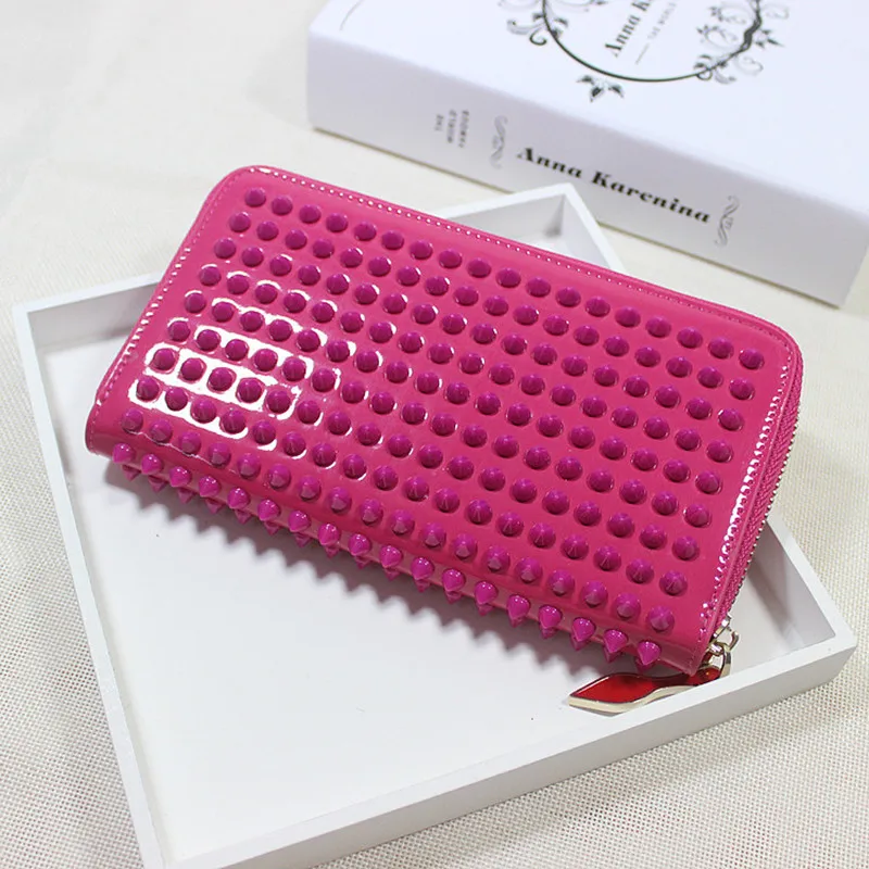 

2018 top hot sale new arrival genuine leather unisex mini wallets rivets long purse female hand bag zipper large capacity Ladies