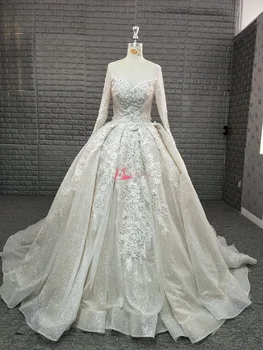 

Luxury Dubai Long Sleeve Wedding Dresses 2019 Shiny Fabric Pearls Ball Gown Cathedral Long Train Bridal Gowns Robe de mariage