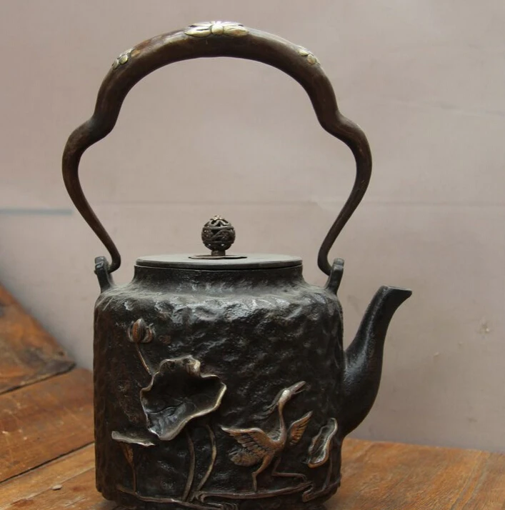 

Collectible bronze S2310 9 Japanese Iron Silver Gilt Lotus Crane Mountain Moon Flagon Kettle Wine Tea Pot