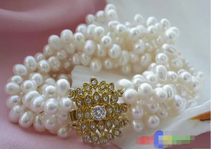 

Free Shipping >>>> p2282 6ROW 7MM WHITE RICE FRESHWATER CULTURED PEARL BRACELET