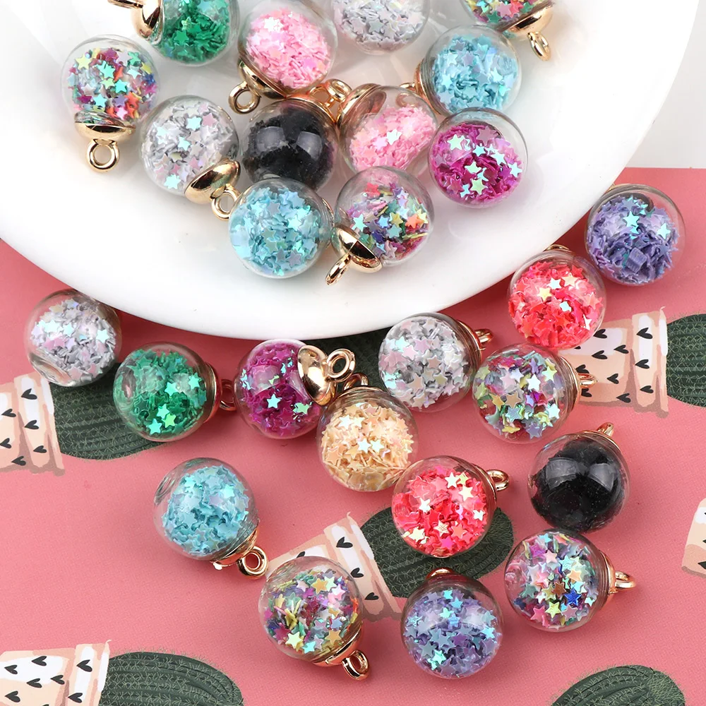 Charmsenamelled charms background pink murines fried glass glass balls For earrings.