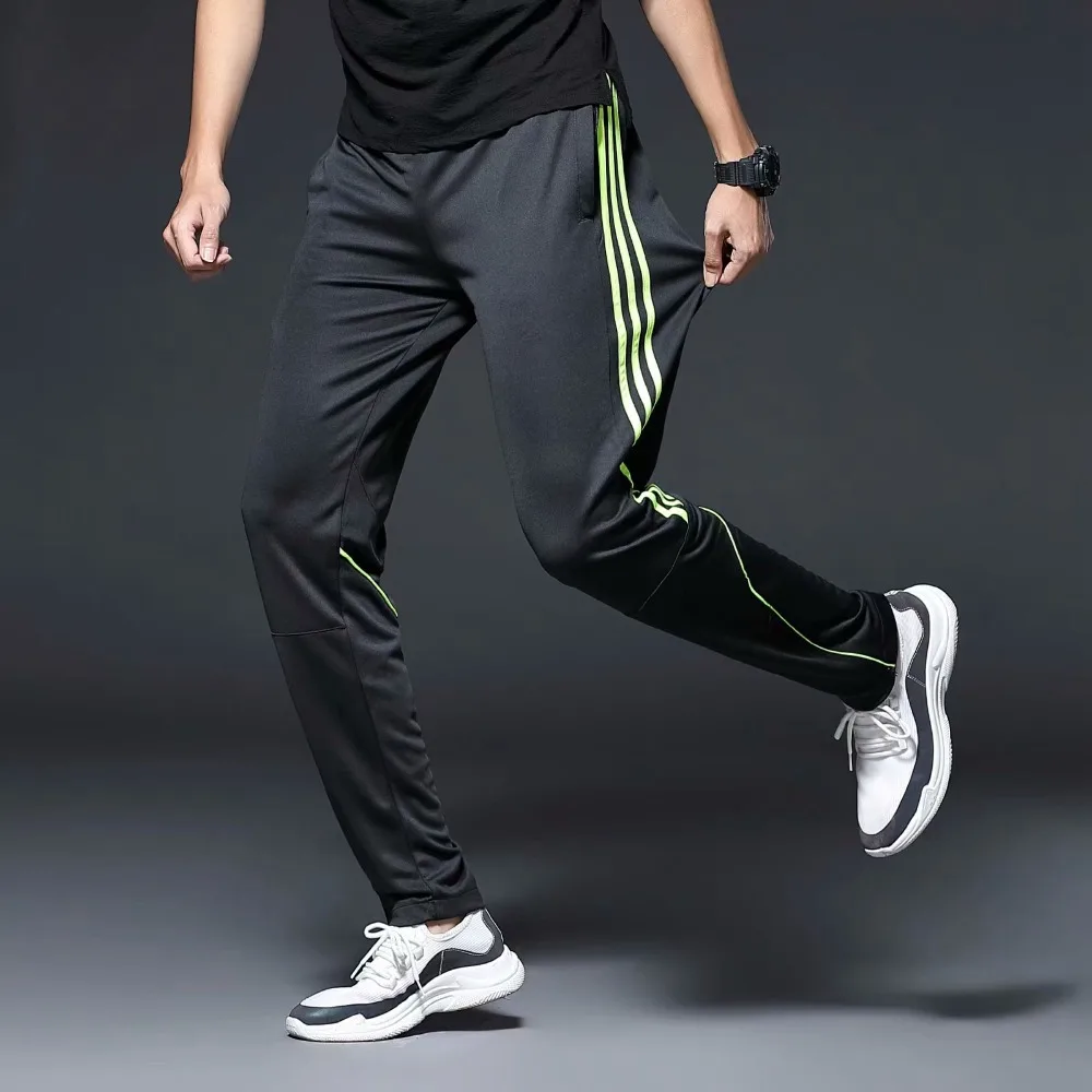 Koop Mannen Sport Running Broek rits Zakken Atletische Voetbal Training sport Broek Elasticiteit Legging jogging Gym Broek